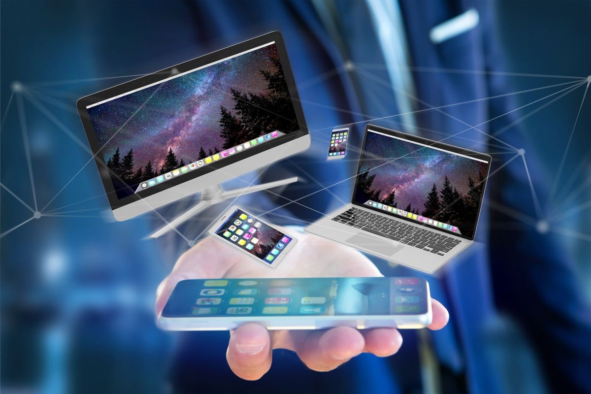 View of Devices like smartphone, tablet or computer flying over connection network - 3d render